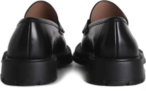 Salvatore Ferragamo Zwarte platte schoenen met handtekening dwarsbalk Black Heren