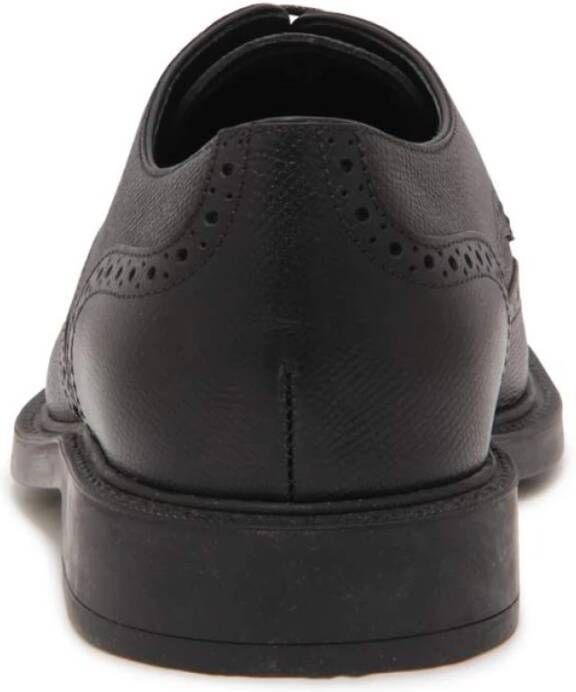 Tod's Zwarte leren Derby schoenen met rubberen zool