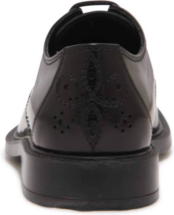 Tod's Zwarte leren veterschoenen met bloemen