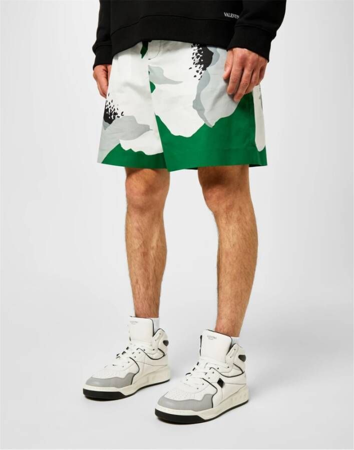 Valentino Garavani Studded Mid-Top Sneakers