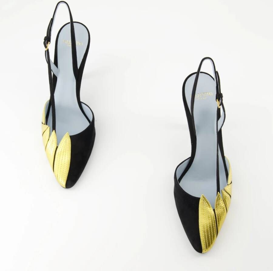 Valentino Garavani Zwarte en gouden leren pumps