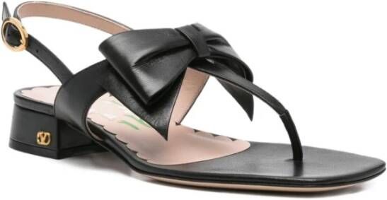 Valentino Garavani Zwarte leren teenslippers met strik