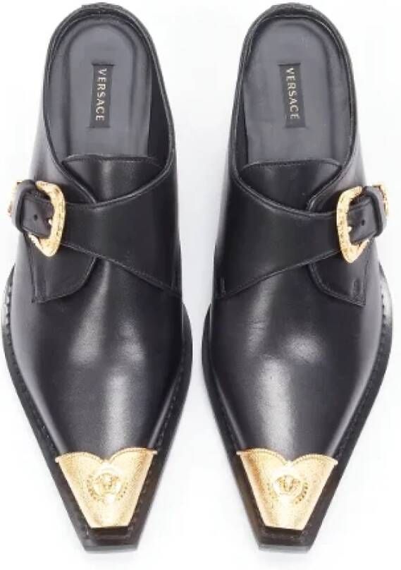 Versace Pre-owned Leather mules Black Dames
