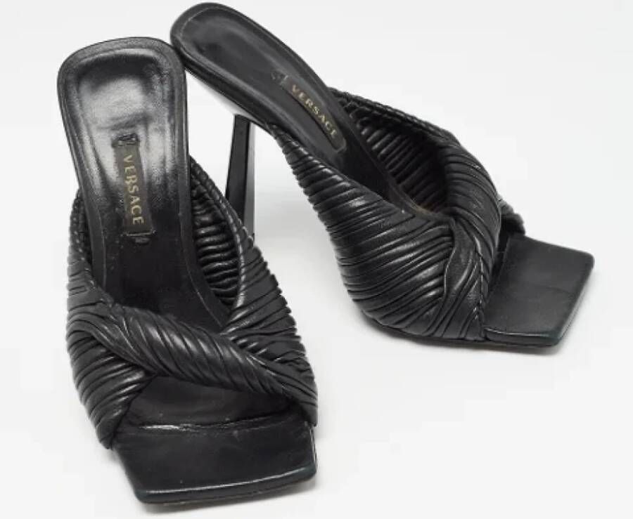 Versace Pre-owned Leather sandals Black Dames