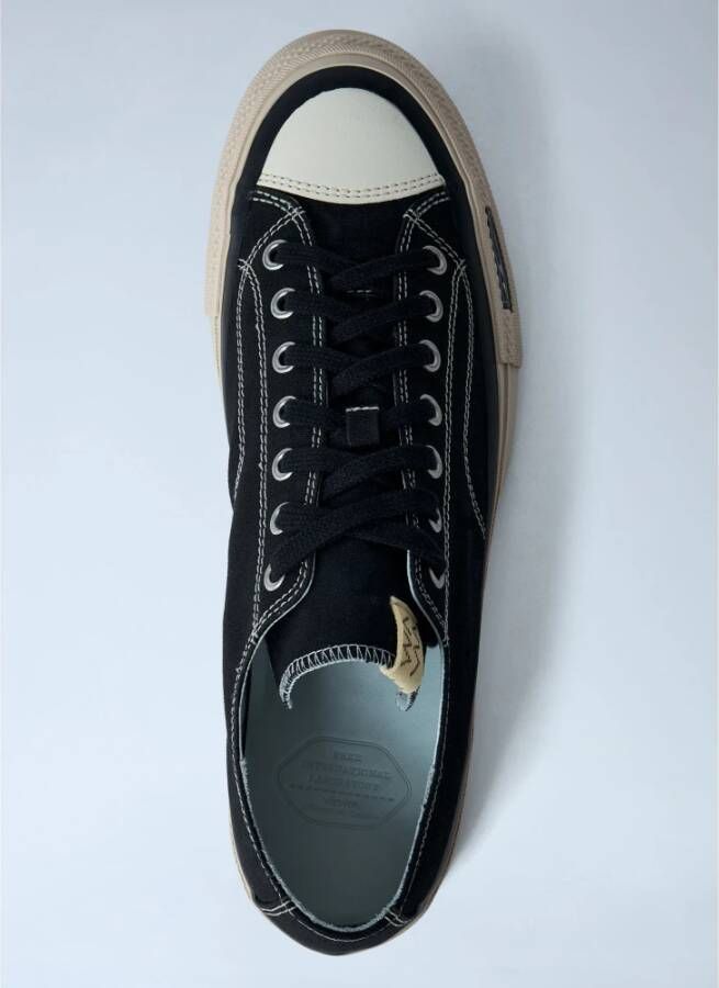 visvim Versleten katoenen sneakers met rubberen neus