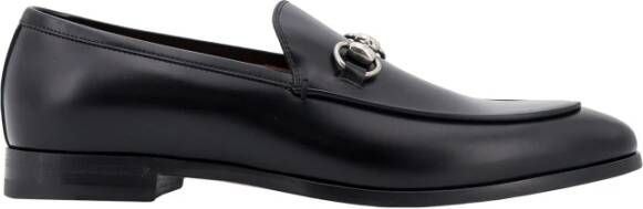 Gucci Platte zwarte schoenen met metalen gesp