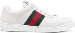 Gucci Witte leren sneakers met logo details