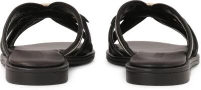 Kazar Comfortabele teenslippers van leer en stof op een platte zool