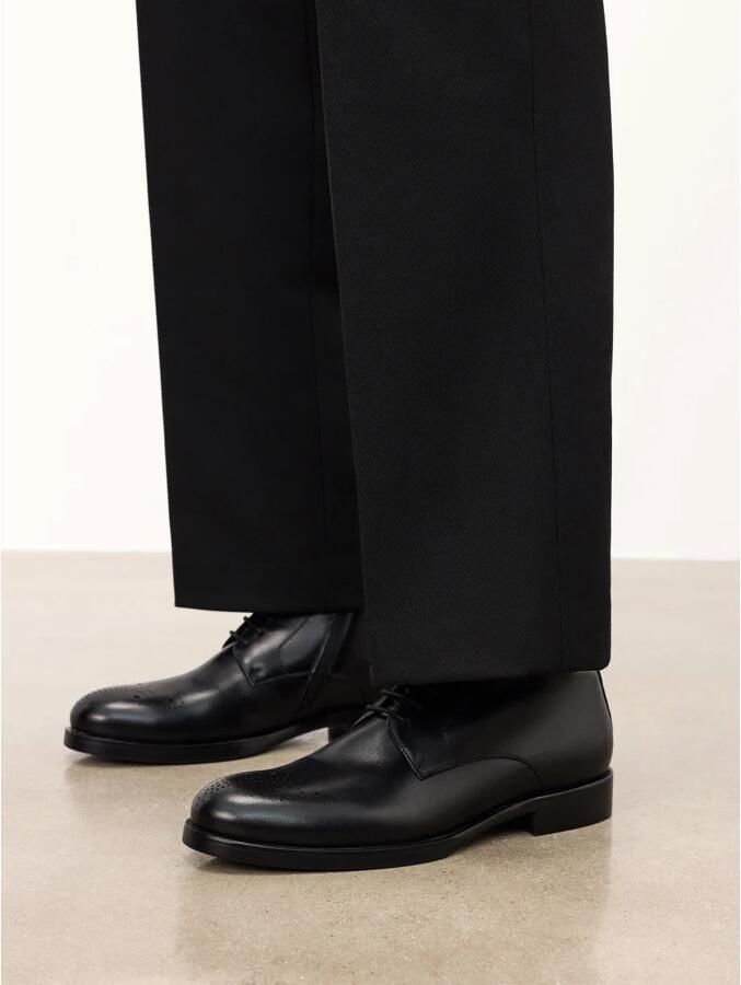 Kazar Zwarte gladleren laarzen met openwerksieraden