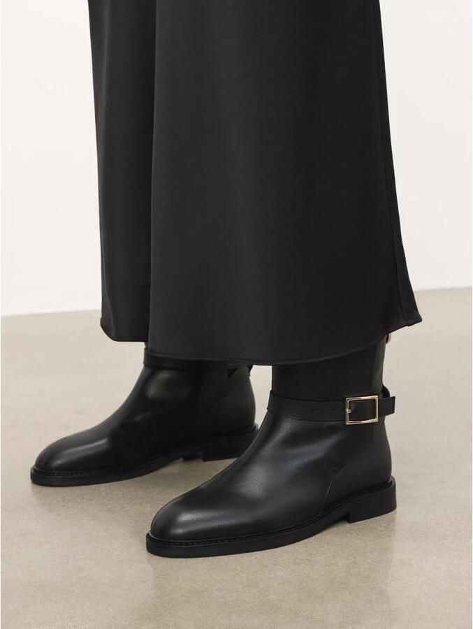 Kazar Zwarte instap laarzen van natuurlijk leer met decoratieve gesp