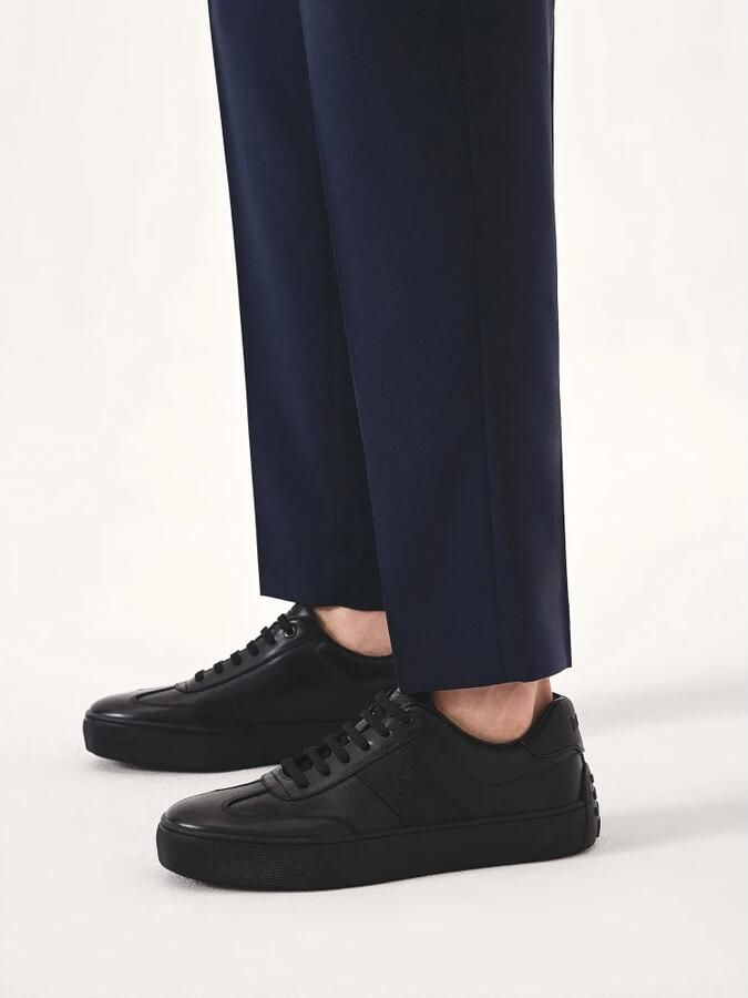 Kazar Zwarte leren sneakers met rubber op de hiel