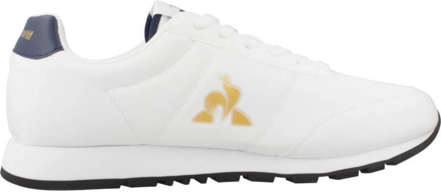 Le coq sportif Moderne witte sneakers met gouden details