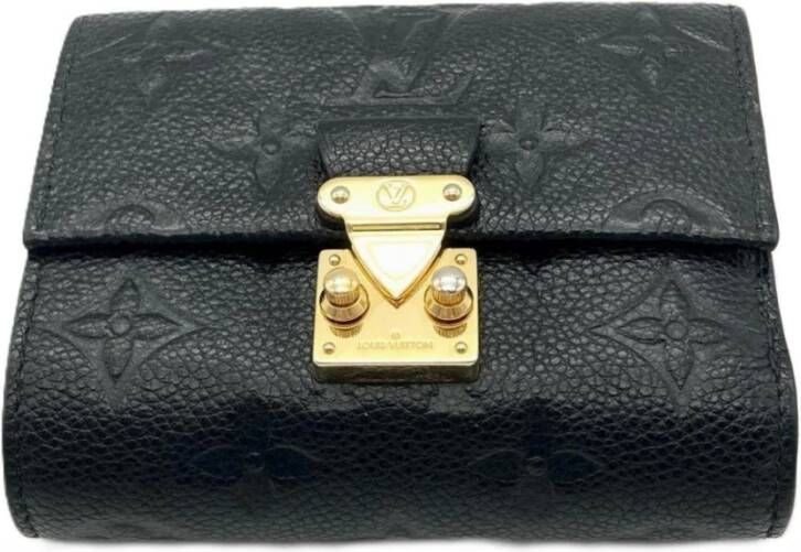 Louis Vuitton Vintage Tweedehands compacte leren portemonnee met draaislot