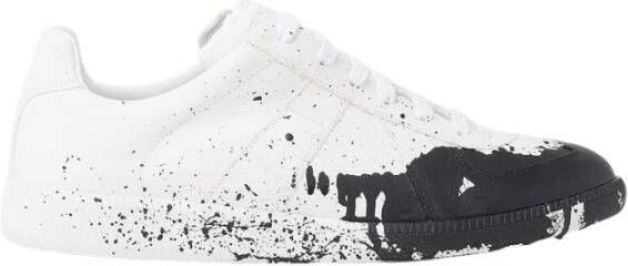 Maison Margiela These arent your ordinary sneakers. Boasting a paint splatter design theyre meant for the ones who enjoy thinking outside of the box Wit Heren