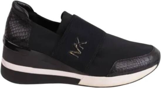 Michael Kors Pre-owned Leather sneakers Black Dames