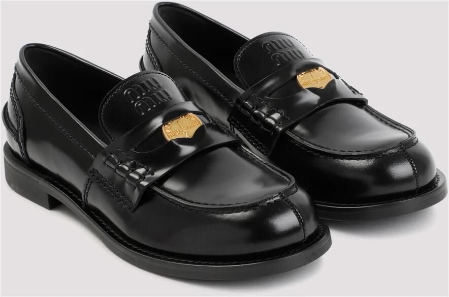 Miu Leren Penny Loafers
