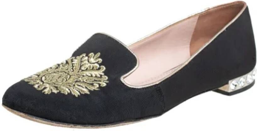 Miu Pre-owned Canvas flats Black Dames