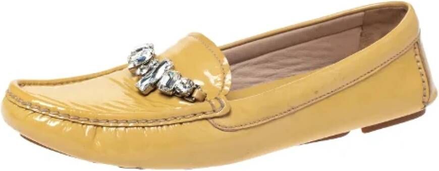 Miu Pre-owned Leather flats Yellow Dames