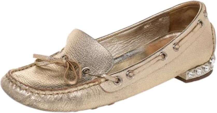 Miu Pre-owned Leather flats Yellow Dames