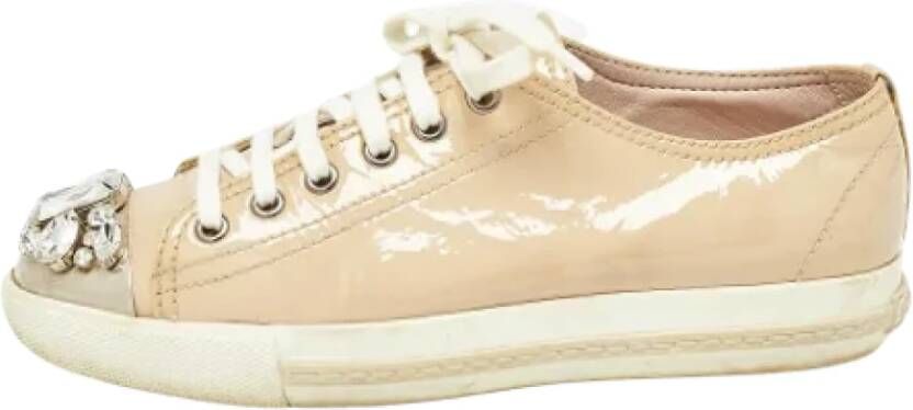 Miu Pre-owned Leather sneakers Beige Dames