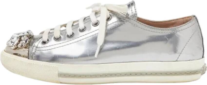 Miu Pre-owned Leather sneakers Gray Dames