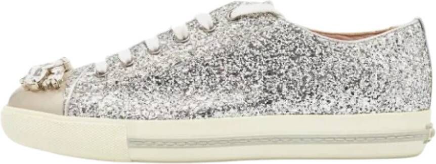 Miu Pre-owned Leather sneakers Gray Dames