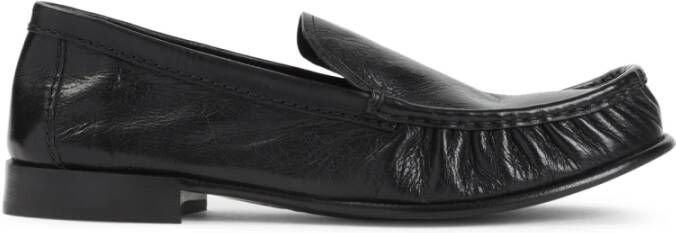Miu Zwarte leren loafers met reliëfstiksels