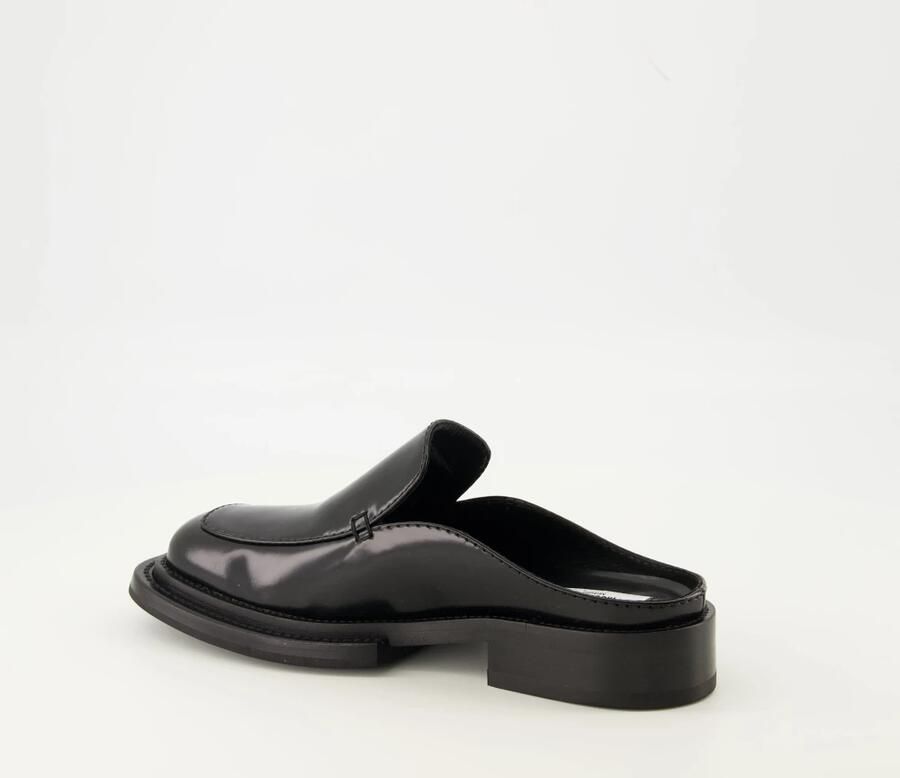 Moschino Leren Muiltjes Elegant en Comfortabel