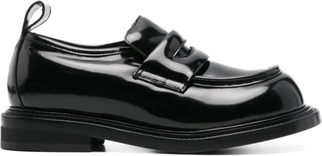 Moschino Zwarte leren platte schoenen