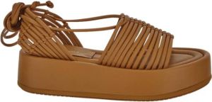 Paloma Barceló Platte sandalen Oranje Dames