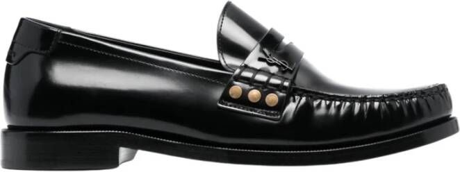 Saint Laurent Leren platte schoenen met reliëf achterkant Black Dames