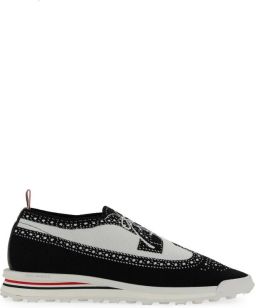 Thom Browne Longwing Brogue met Tech Runner Zool in Trompe Loeil Knit