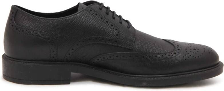 Tod's Zwarte leren Derby schoenen met rubberen zool
