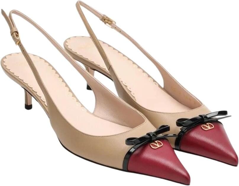 Valentino Garavani VLogo Signature Bow Slingback Pumps ([shopstyle.com](https: www.shopstyle.com g women valentino vlogo-signature-bow-detailed-slingback-pumps 1114153097?utm_source=openai))