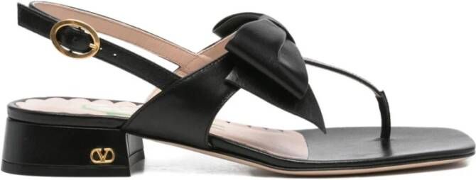 Valentino Garavani Zwarte leren teenslippers met strik