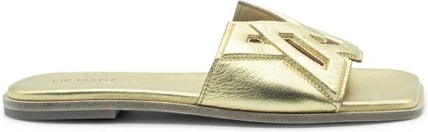 Vic Matié Vierkante open monogram gouden slipper
