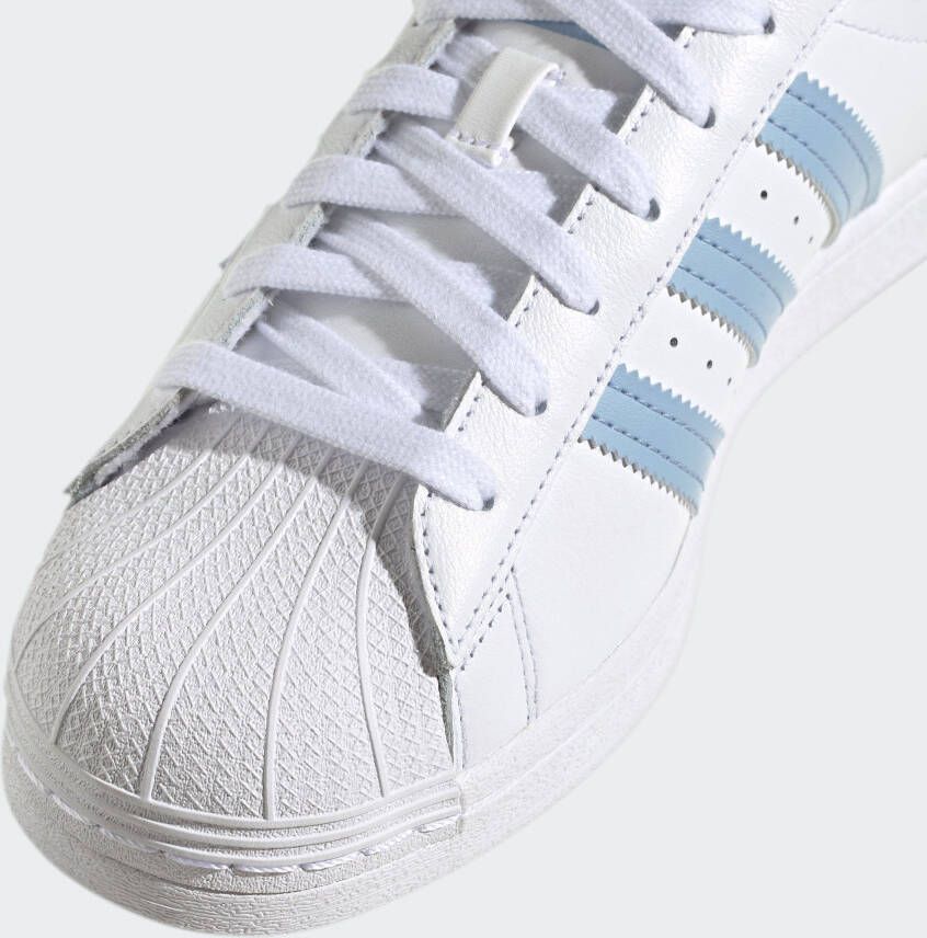 Hoeveelheid van Giet klem Adidas Originals Superstar sneakers wit lichtblauw - Schoenen.nl
