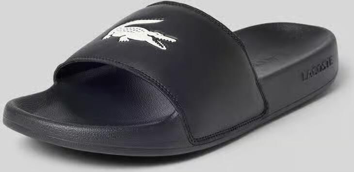 Lacoste Badslippers met logoprint model 'SERVE SLIDE'