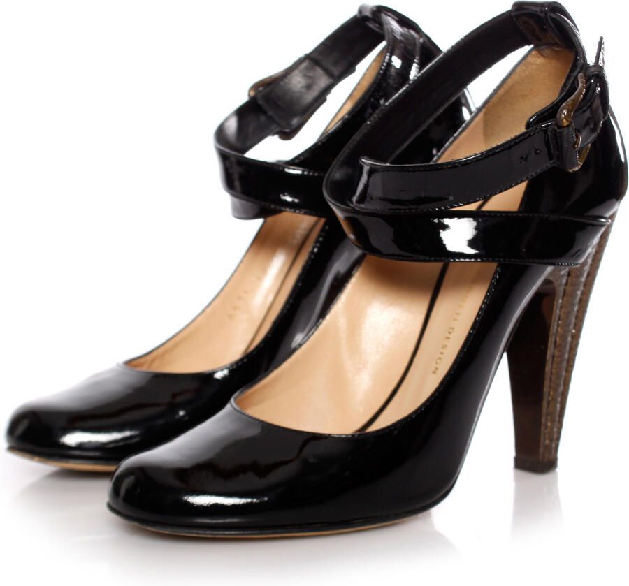 Giuseppe Zanotti Pre-owned Giuseppe Zanotti zwarte lakleren pumps met bronskleurige hak .