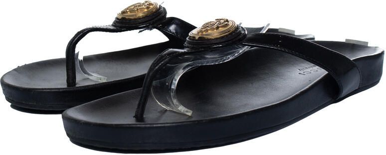 Gucci Pre-owned Gucci zwarte leren sandalen met T-bandje en hysterische details