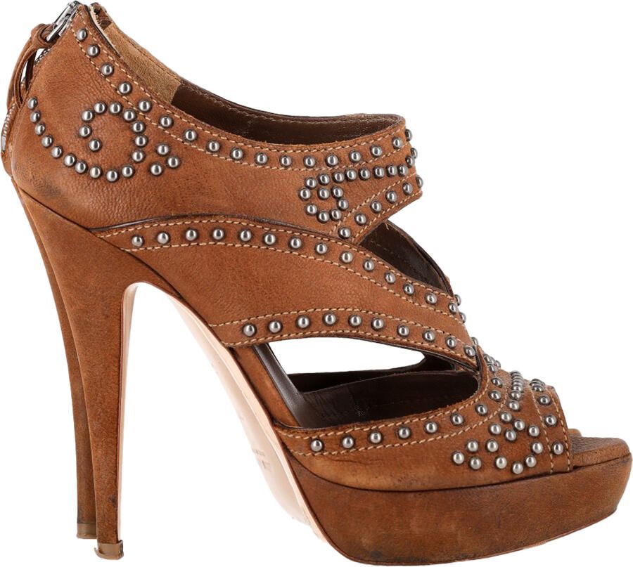 Miu Pre-owned Miu pumps met open neus en platformzool versierd met studs in bruin leer.