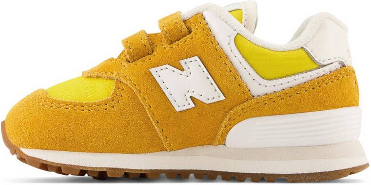New Balance 574 sneakers oker geel zit